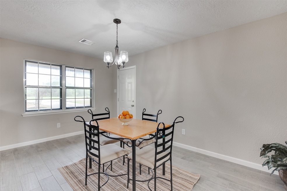 321 Wheeler Dr, Alvin, TX 77511 - photo 1