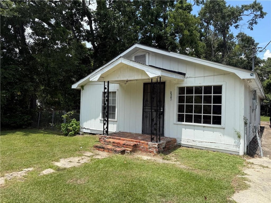 View of front of home with a front lawn