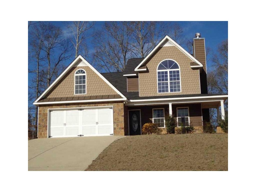 Exterior Front. HARDIPLANK AND STONE ACCENT EXTERI