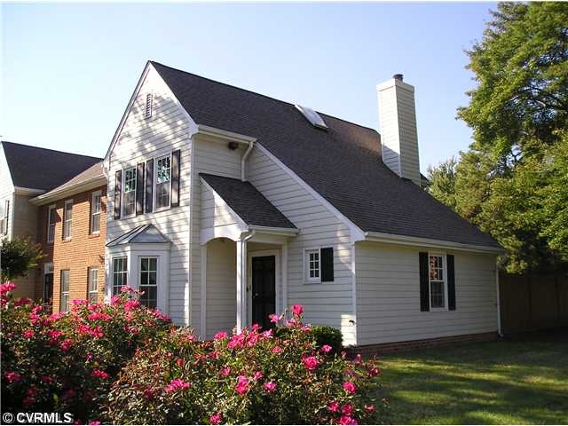 Exterior Front - Parklike setting with huge shade 