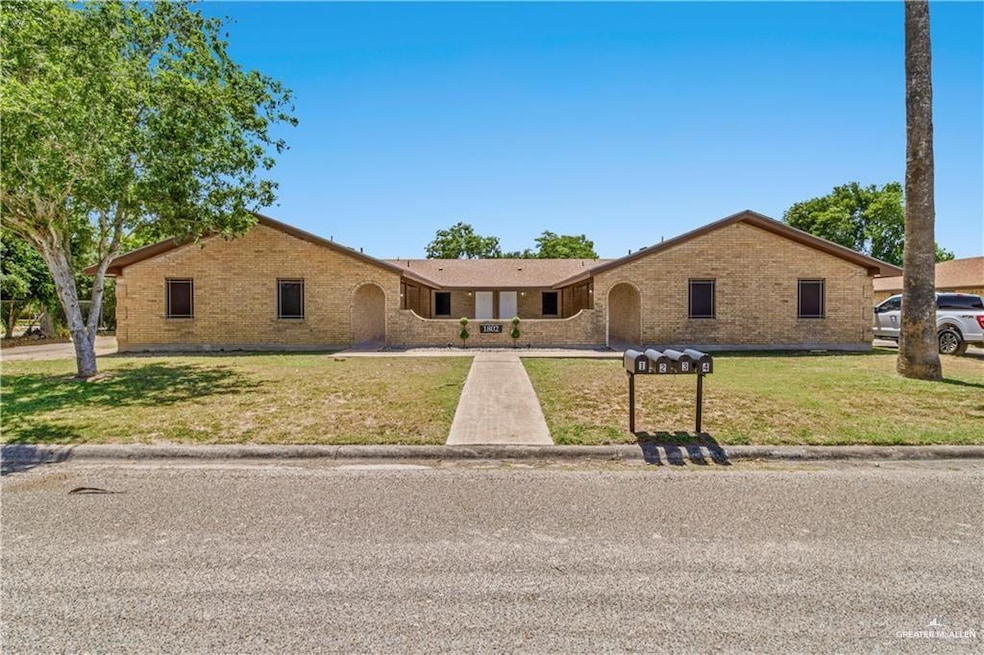 Ranch-style home featuring a front yard