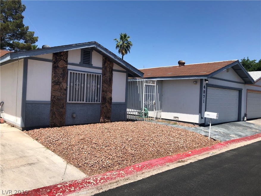 Side driveway PLUS two car garage!!