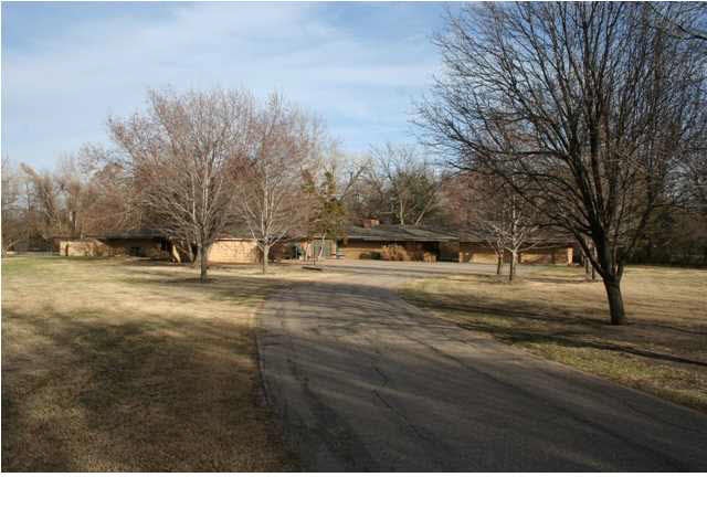 Custom built contemporary ranch on 3 acres in Spri
