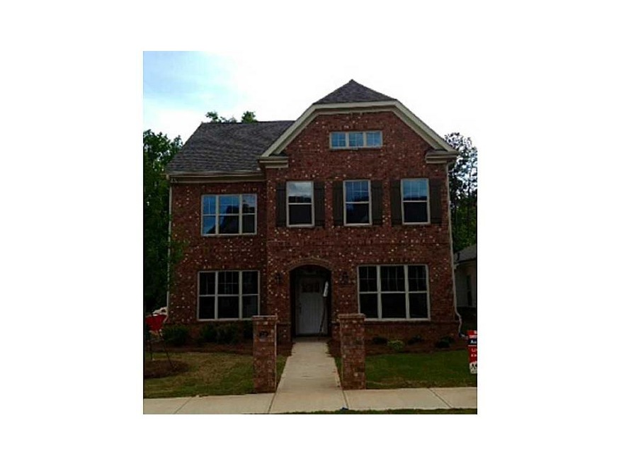 Exterior Front. Brick  front elevation, 2 car rear