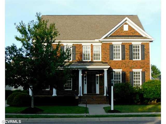 Exterior Front - Brick front, with large front por