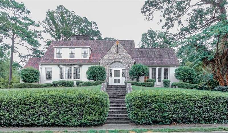 Stone and Hardcoat Stucco Historic Home with Clay 