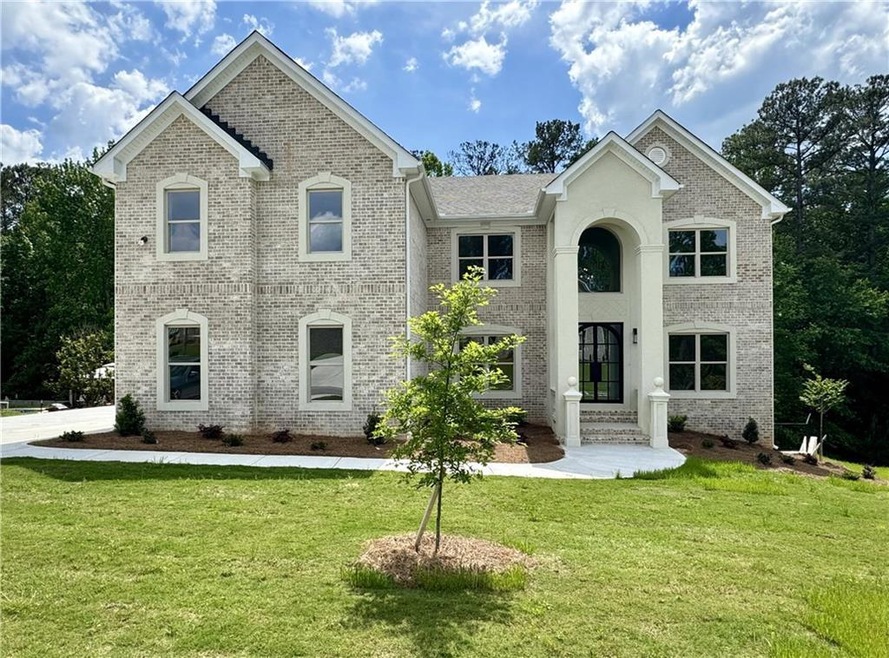 View of front of property featuring a front yard