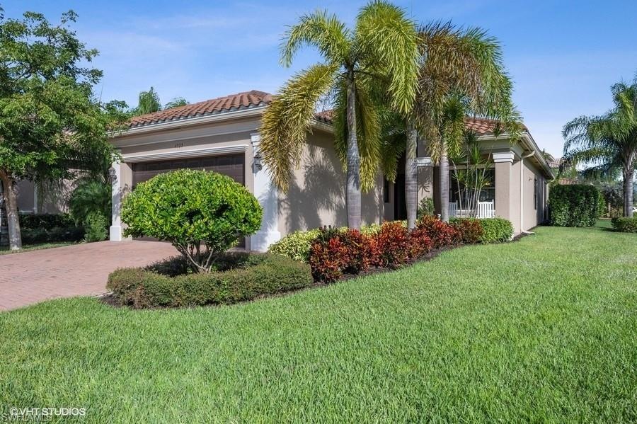 Front view, corner lot with private fenced back ya