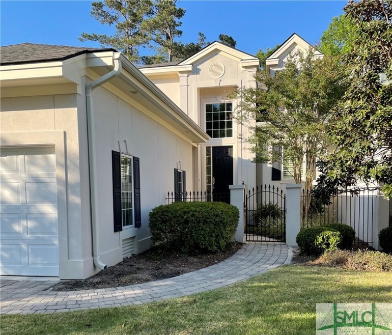 Stunningly renovated townhome with 3 BRs with ensu