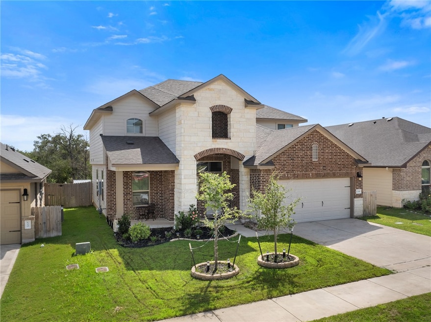 French provincial home featuring a shingled roof,