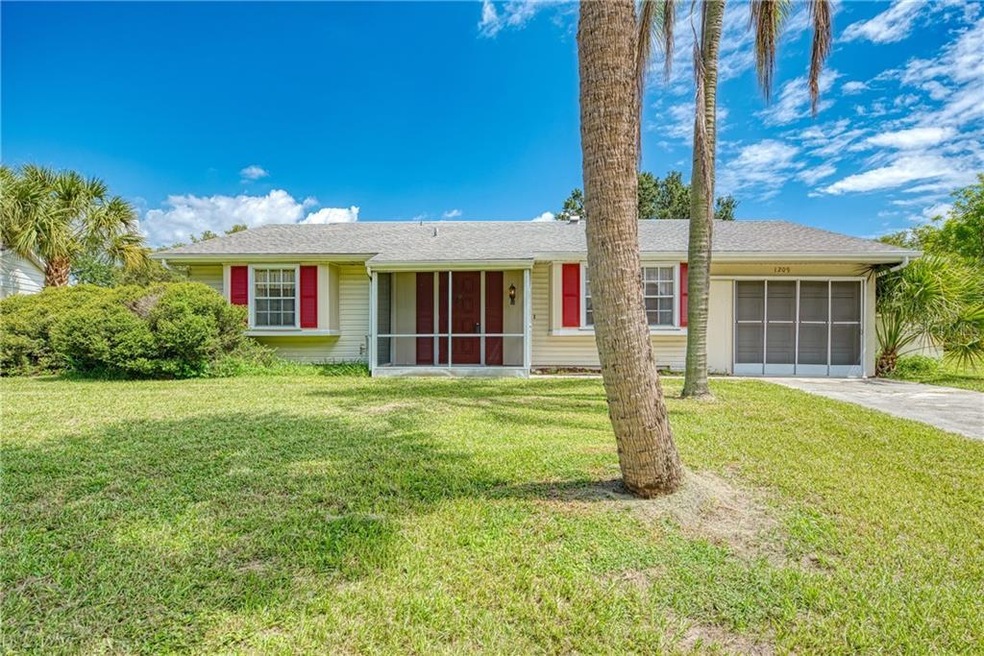 1209 Price Cir NW, Port Charlotte, FL 33948 - photo 1