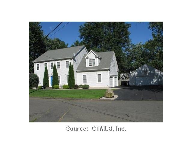 Exterior Front. Private landscaped home with 2 att