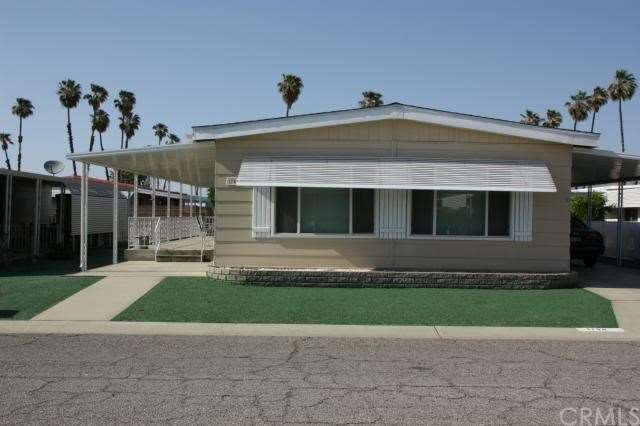 Front of home, faces South, patio on west side, dr
