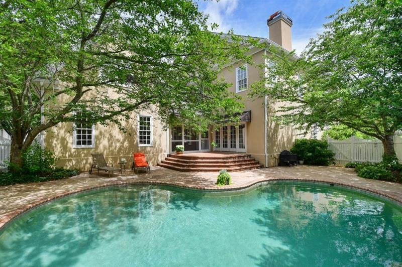 Walk out the main level to a private pool