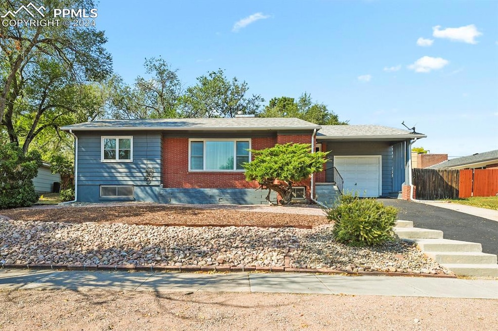 Ranch-style home with a garage