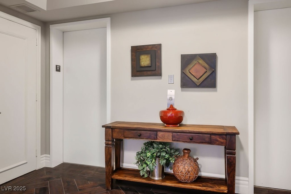 Private elevator lobby with real wood herringbone.
