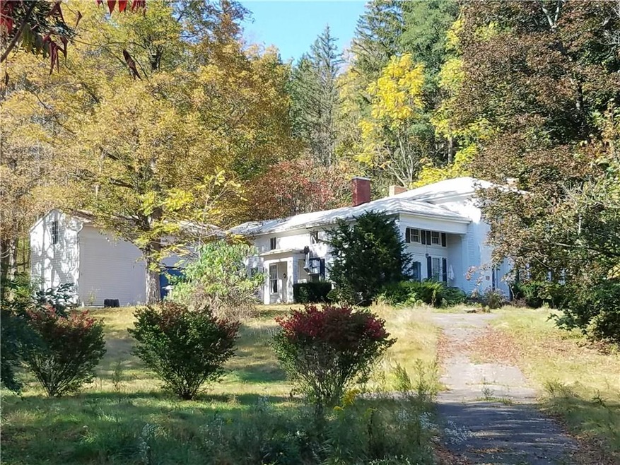 Still claims a gracious driveway to the home
