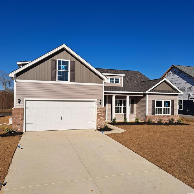 Craftsman inspired home with a garage
