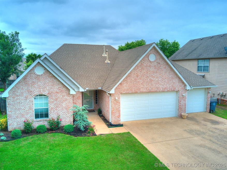 Full brick, 3 car garage