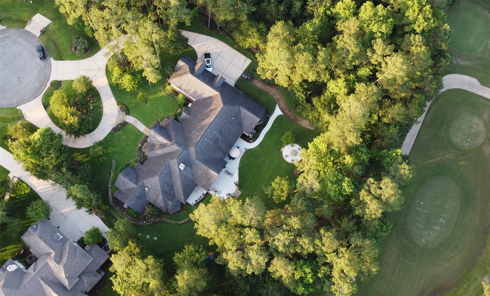 Welcome home to 28432 Meadow Forest! Tee Box 1 of High Meadow Golf Club is just behind the property.