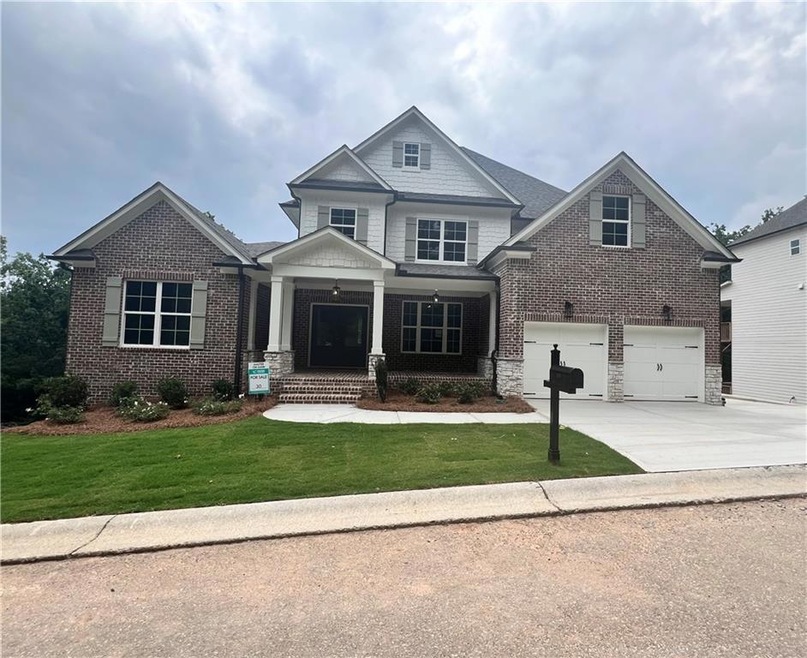 Craftsman-style house with covered porch, a garage