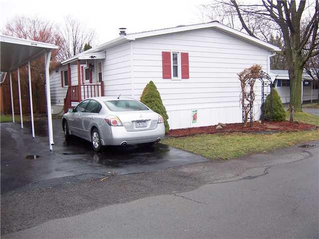 Exterior Front. Corner lot with covered entry.