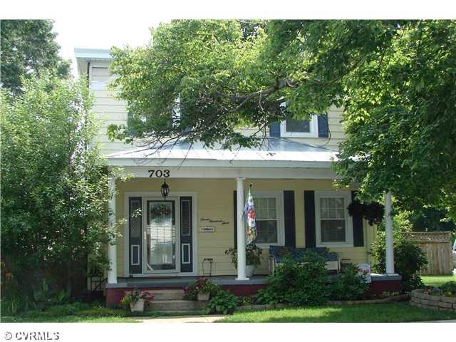 Exterior Front - Cool and shaded front porch with 