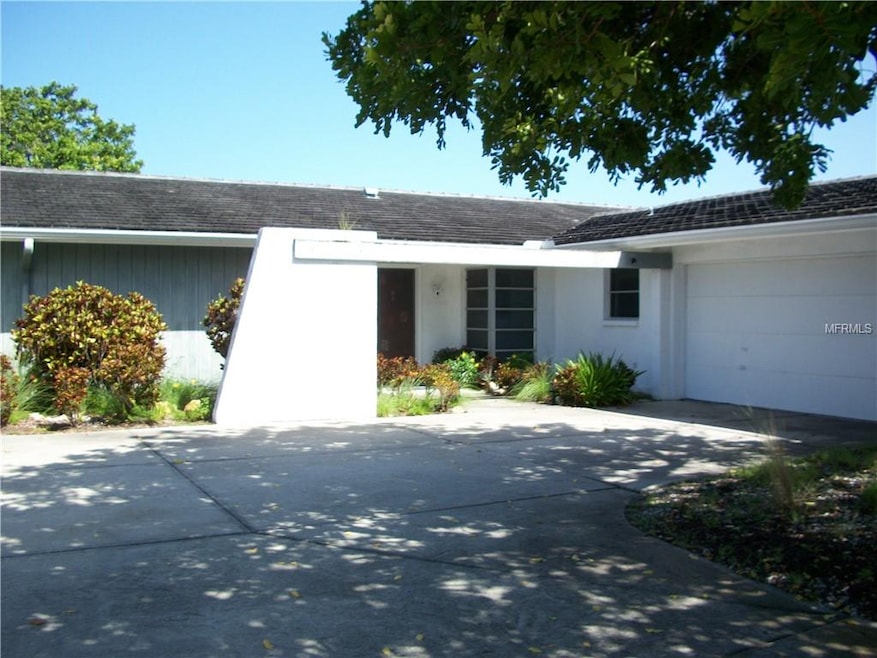 Front of home with extra large garage.