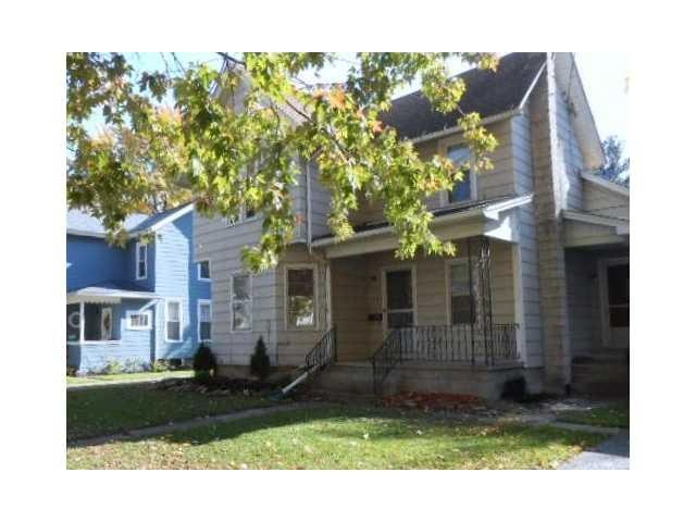 Exterior Front. Just right for families. This home has good bones. A two story Colonial in a quiet neighborhood. First floor bedroom with 1/2 bath, livingroom, kitchen, and dining room. Two bedrooms and full bath upstairs.