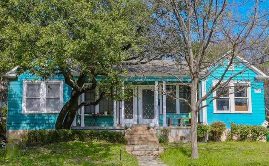 View of front of property featuring covered porch