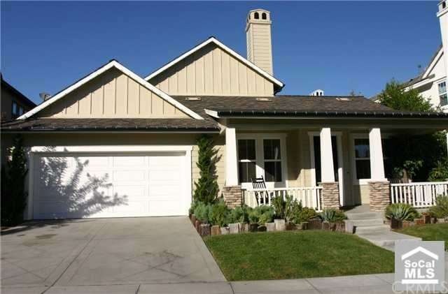 Front of home with unique, custom landscaping.