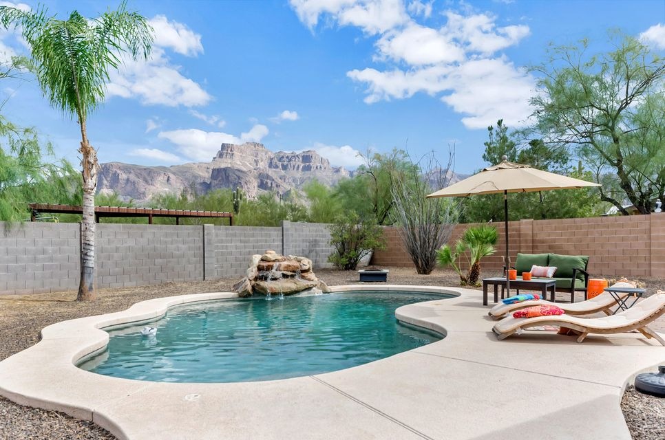 Sparkling pebble tec pool with views