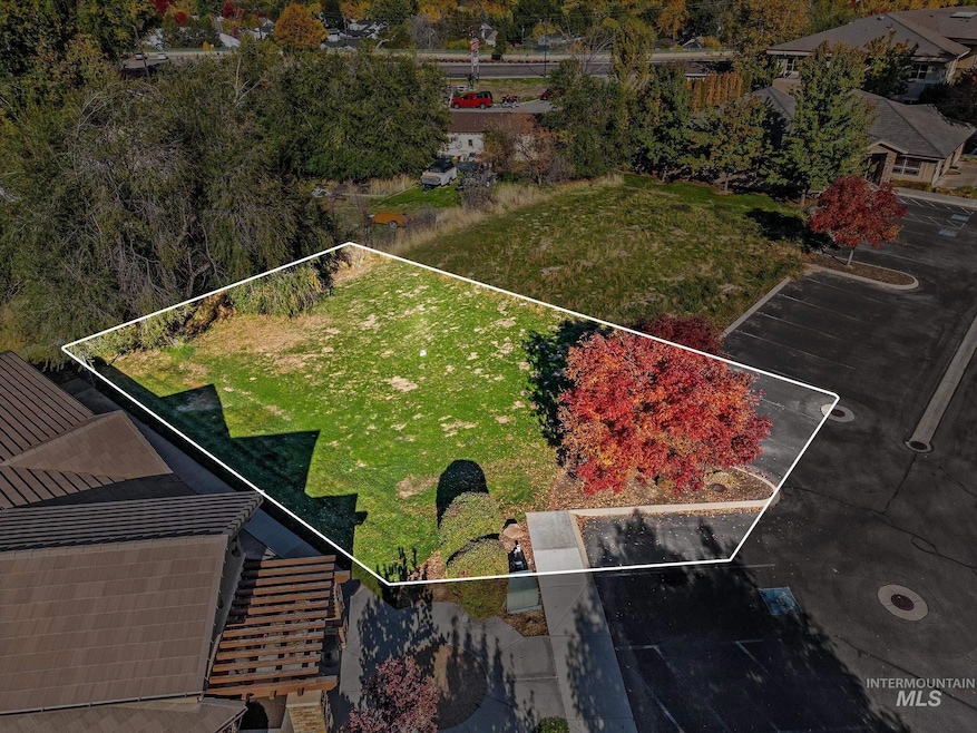 Aerial overview of property's location with property parcel outlined
