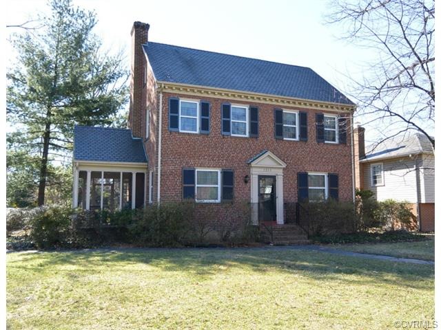 Brick and Slate exterior with walkways from Westwood Ave and side street to the front door. 23 Thermal replacement windows for energy efficiency.