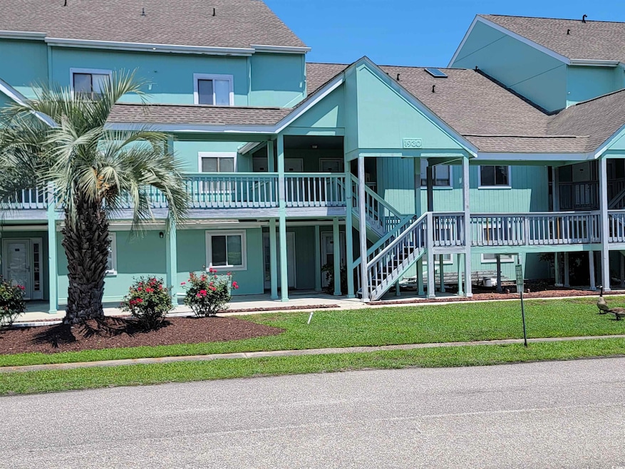 View of property featuring stairway