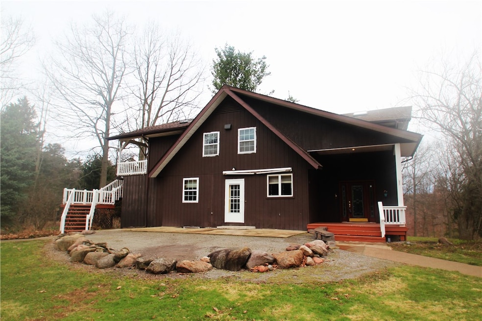 Front Elevation with awesome Rock bordered Patio