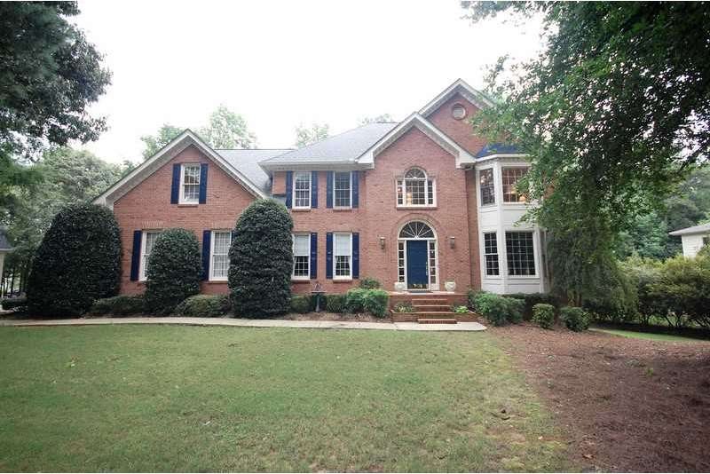 Exterior Front. Beautiful all brick home in popula