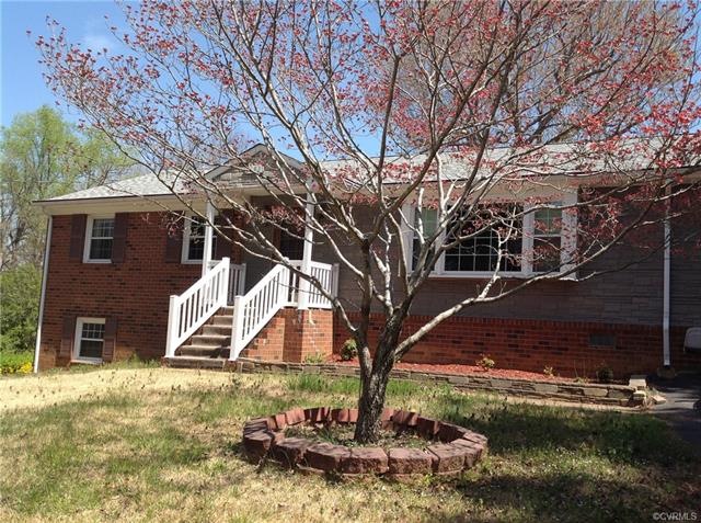 Well constructed raised ranch with a lower level w