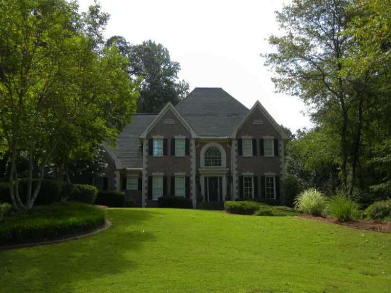 Exterior Front. Beautiful setting and curb appeal 