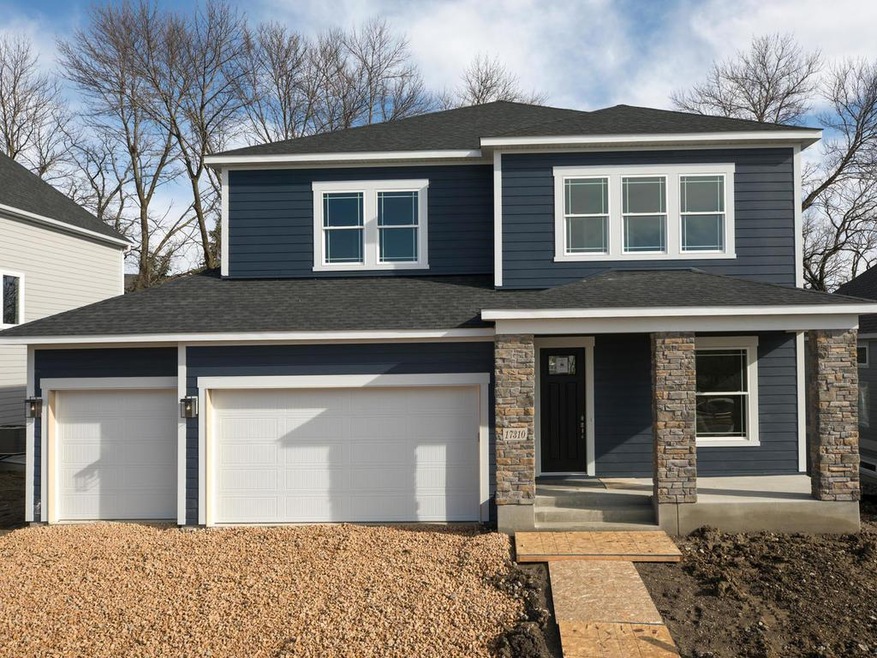 Front porch overlooks Elm Creek. Full landscape pa