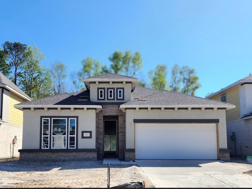 Beautiful stucco front elevation with full brick on sides and rear.
