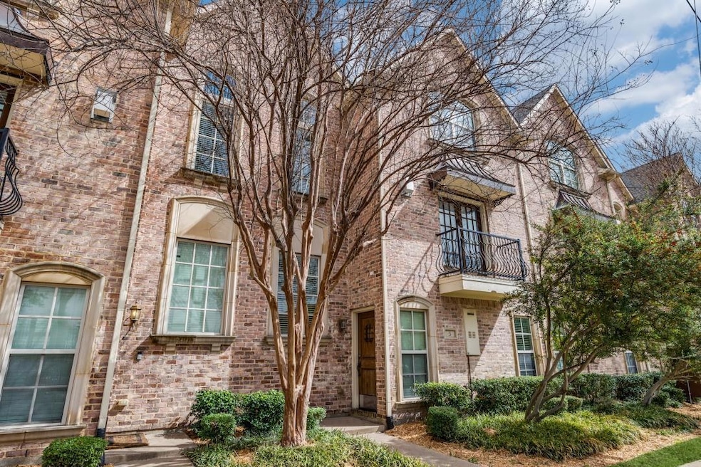 View of front of house featuring brick siding