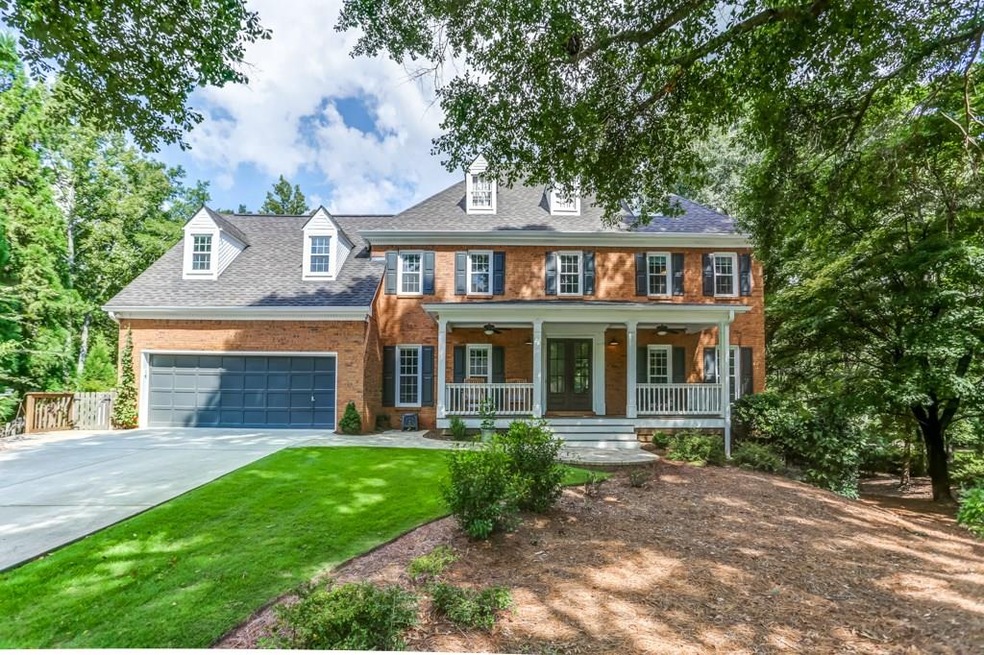 Beautiful brick home with front porch welcomes you