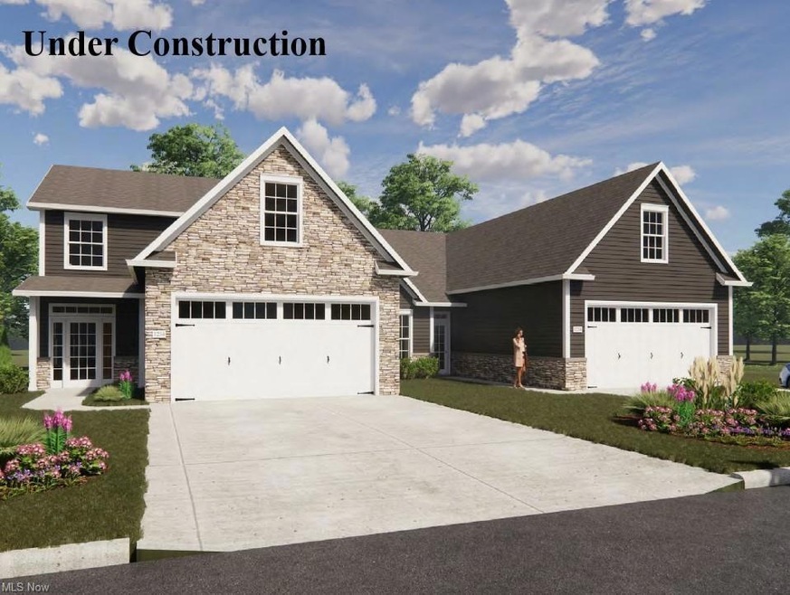 Welcome to 3542 Red Tail Cir! This is and end unit Concord without a basement. This model is a 2-story. The Conord is on the left with the stone front.