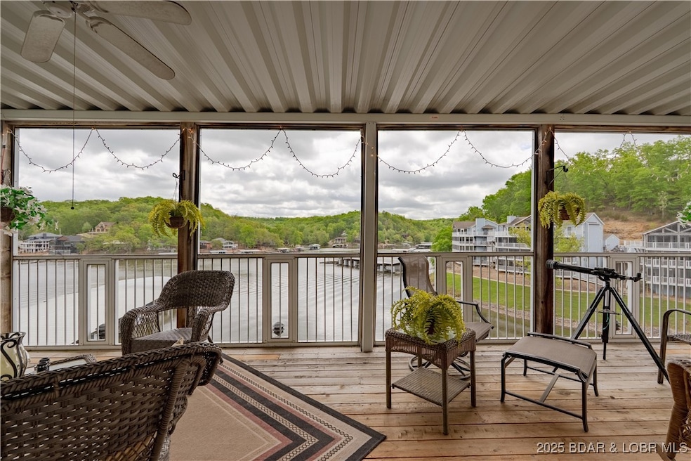 LARGE SCREENED IN DECK IN A COVE SETTING