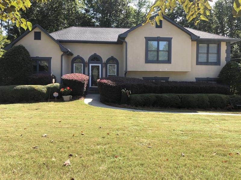 This gem is perfectly situated on a lovely, landsc
