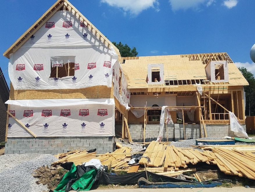 Photo of similar home under construction.