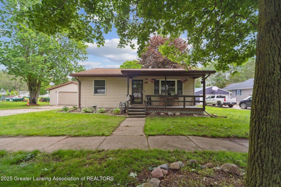 445 S Oak St, Maple Rapids, MI 48853 - photo 1