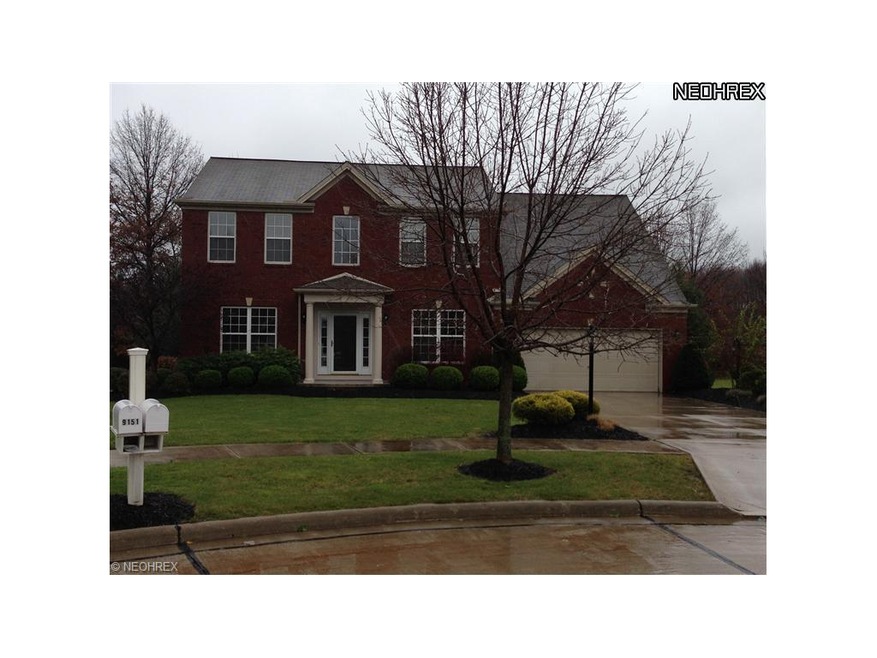 Center Hall colonial with brick front on a cul de 