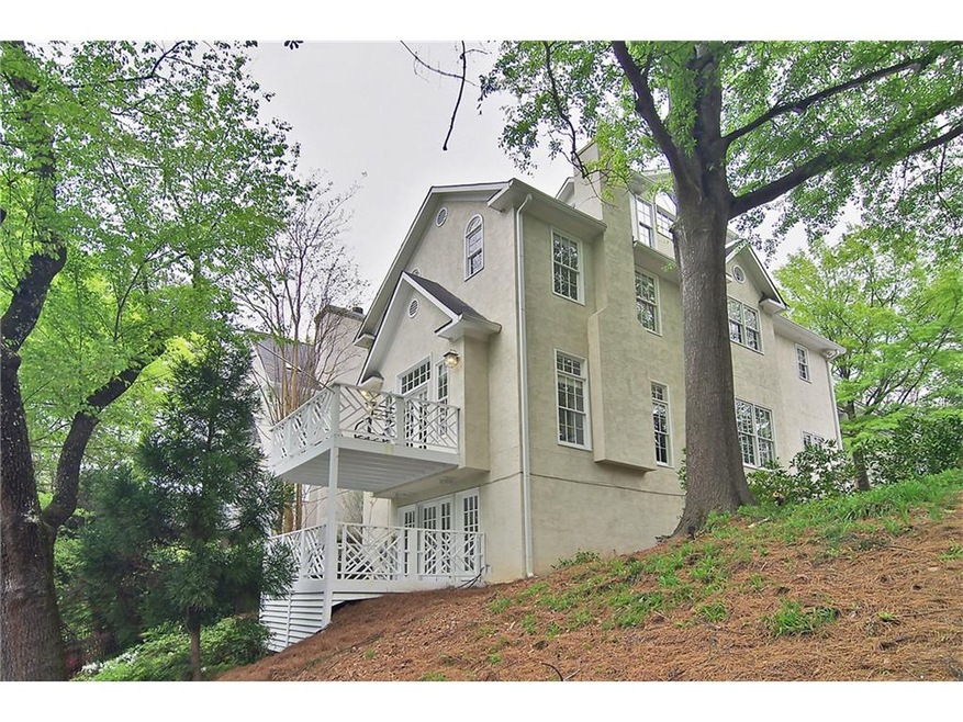 ONE OF FOUR CUSTOM HOMES BUILT IN THE 90'S.   SITTING HIGH ABOVE MONROE DRIVE THIS HILLTOPHOME IS LIKE NOTHING ELSE FOR SALE IN THE ANSLEY/PIEDMONT HEIGHTS/MIDTOWN NEIGHBORHOODS.
